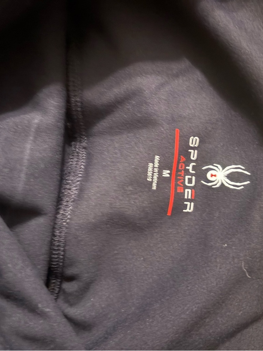 Spyder Black Athletic Top with Red Accent Tag